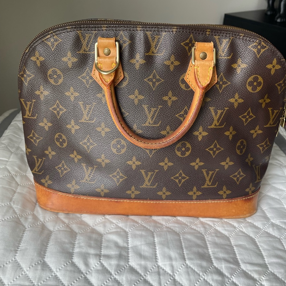 Louis Vuitton Alma Handbag